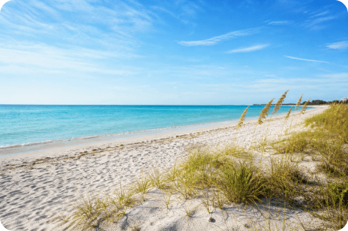 White sand beach and turquoise Gulf water in Naples Florida